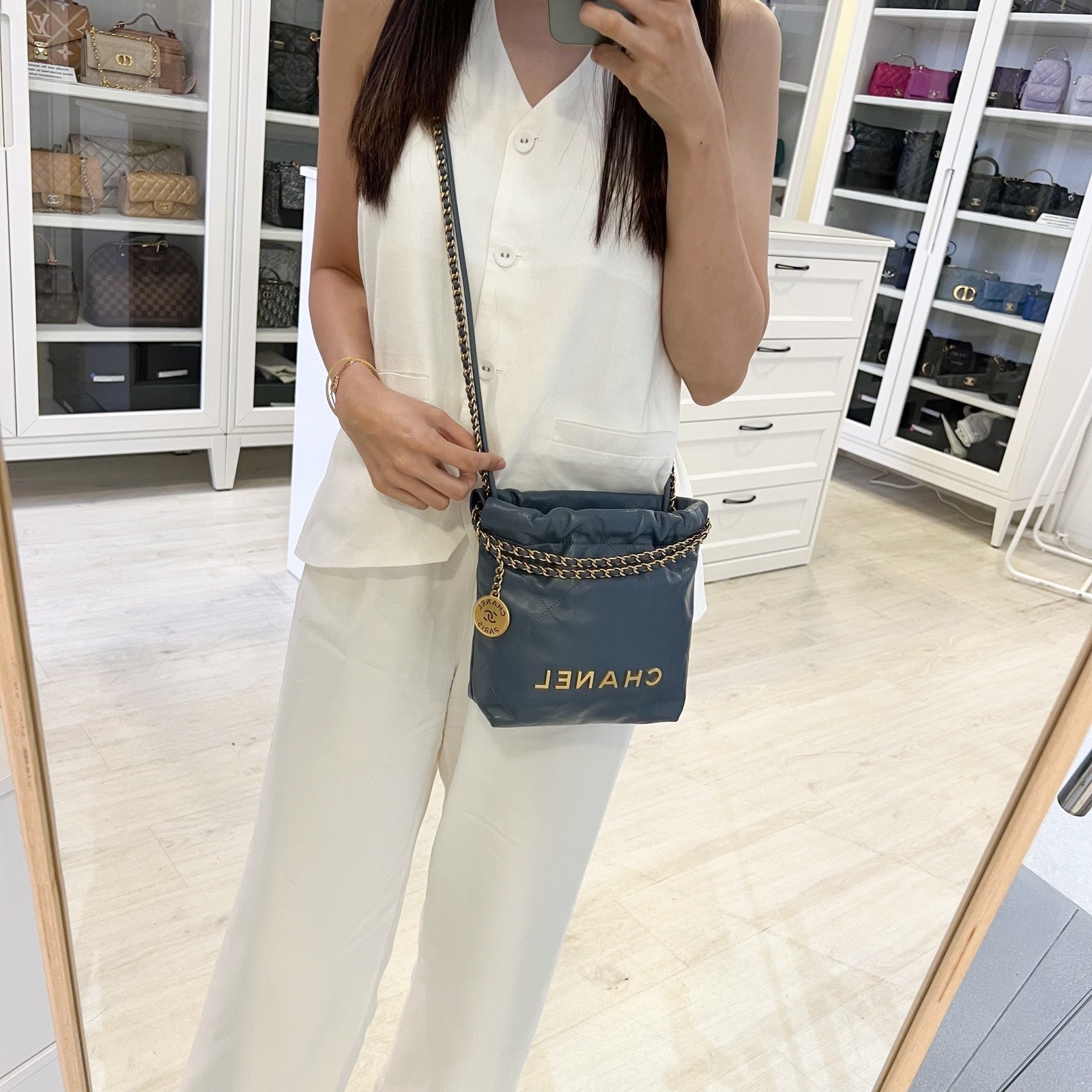 Chanel 22 Mini Hobo Bag In Blue Calfskin And AGHW